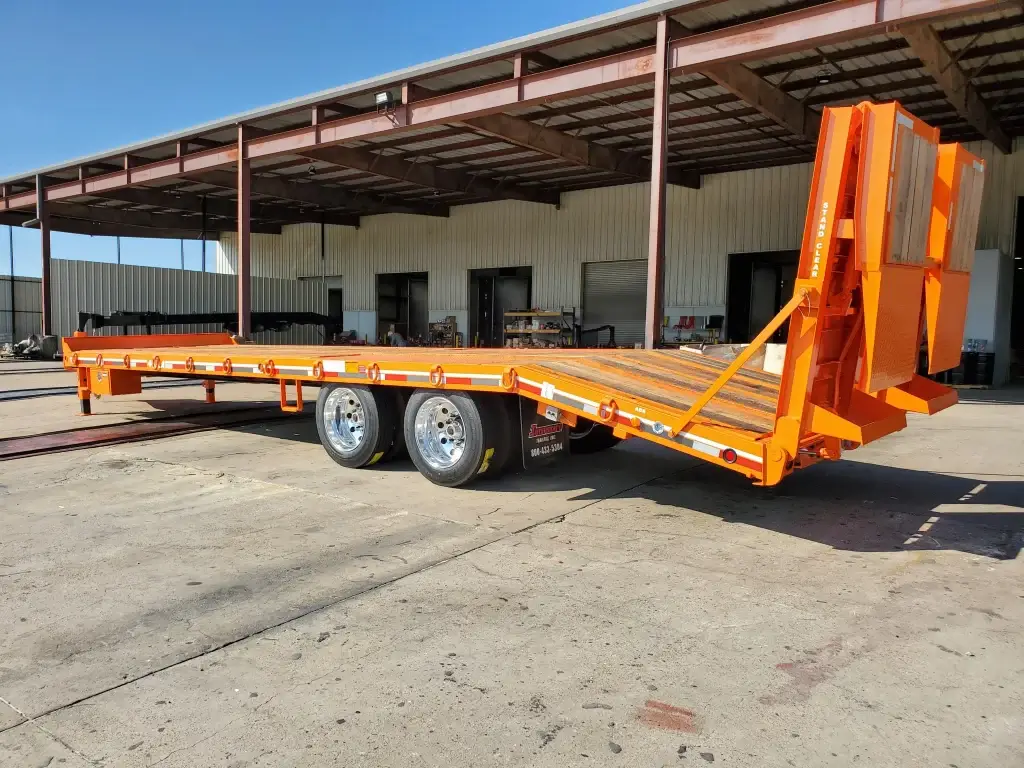 Bi-fold trailer ramps